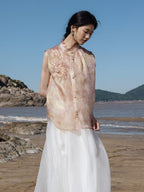 Side view of a blush pink embroidered mulberry silk sleeveless top with mandarin collar from Gambiered Silk.