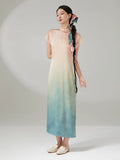 Full-length view of the Gambiered Silk Peach Mist gradient mandarin collar maxi dress with a flowing silhouette.