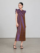 Full-length front view of a purple-bronze silk jacquard dress with a Mandarin collar and relaxed silhouette.
