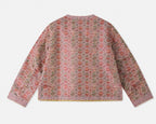 Back product view of the dusty mauve side of the reversible mulberry silk brocade jacket.