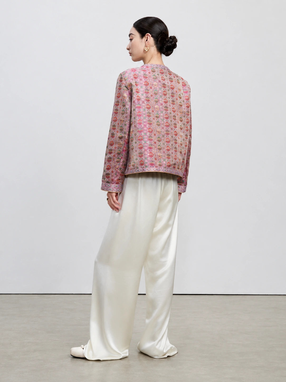 Back view of the dusty mauve side of the reversible 100% mulberry silk Shu brocade jacket.