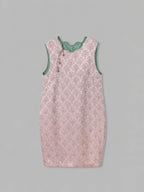 Blush-pink side of the sleeveless reversible Song brocade dress in a relaxed H silhouette.