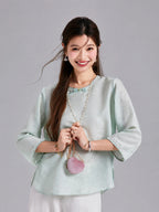Gambiered Silk silk-blend blouse featuring a round neckline, lace-trimmed asymmetric panel and decorative buttons