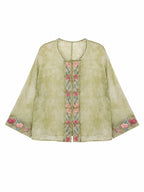 Front view of a sage green embroidered mulberry silk overshirt with long straight sleeves
