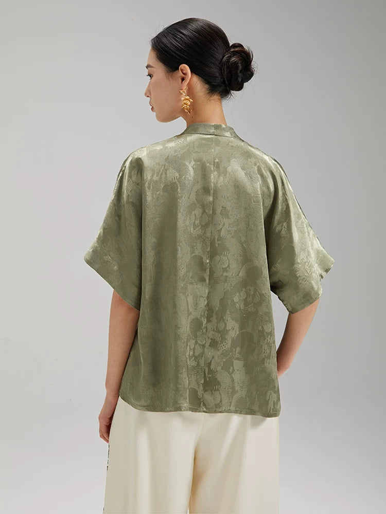 Back view of the Sage Green Jacquard Mandarin Collar Blouse with a relaxed silhouette and soft drape.