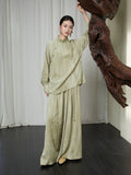 Full-length styling of the Sage Green Mandarin Collar Lyocell Blend Blouse paired with matching wide-leg trousers.