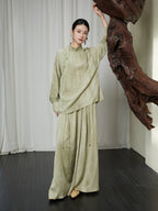 Full-length styling of the Sage Green Mandarin Collar Lyocell Blend Blouse paired with matching wide-leg trousers.