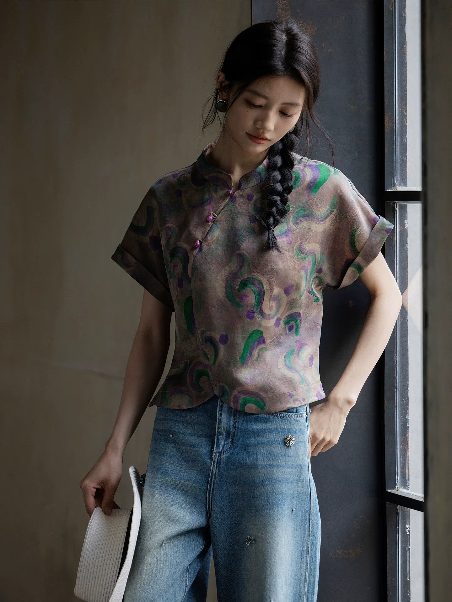 Women's lightweight Gambiered Silk printed blouse photographed in soft natural window light.