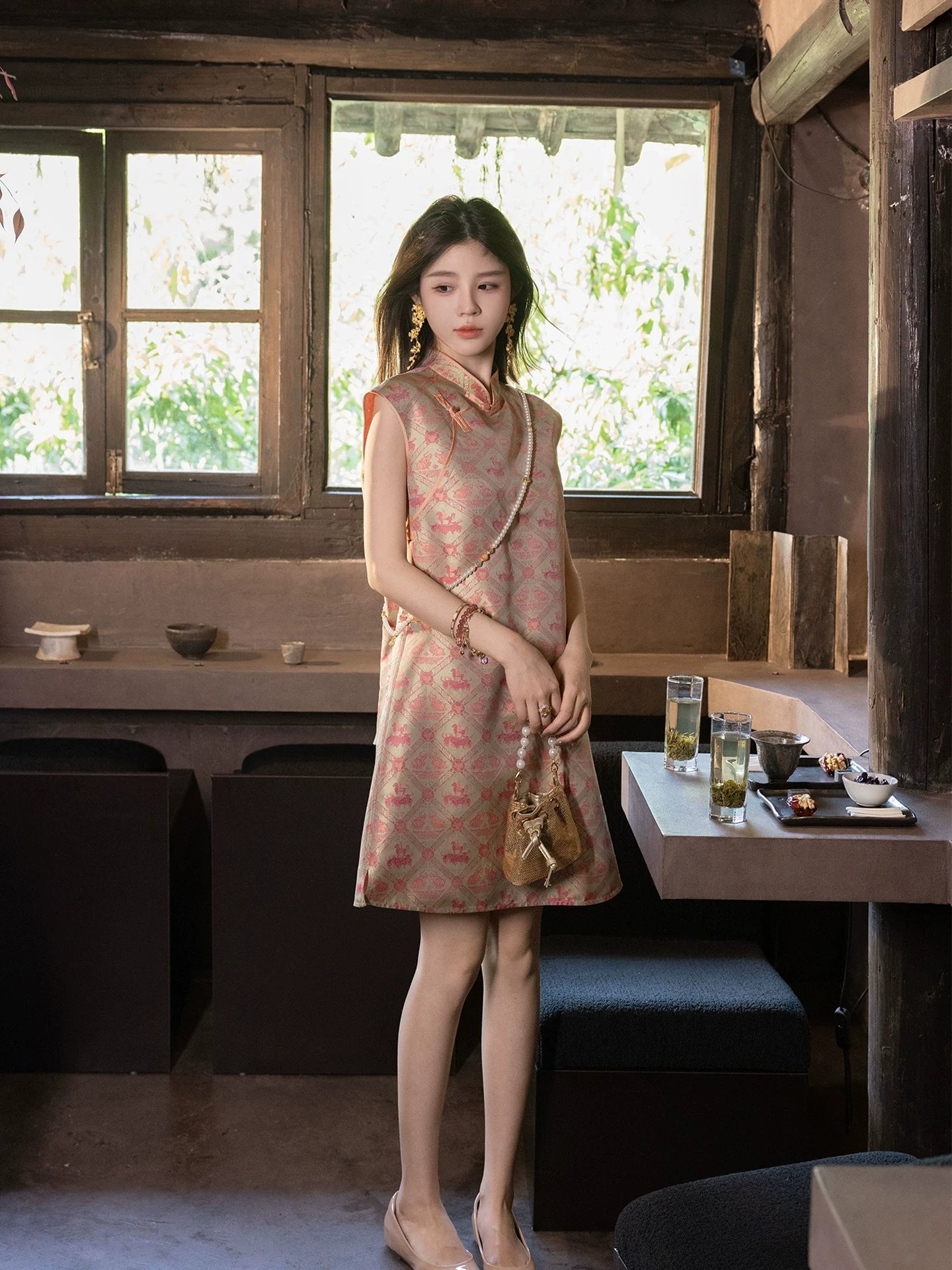 Full-length view of a coral Shu brocade silk dress with a relaxed waist and A-line silhouette.