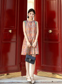 Full-length view of a Gambiered Silk sleeveless Shu brocade dress with circular geometric motifs.