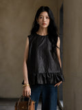 Women's 100% mulberry silk Gambiered Silk sleeveless peplum blouse with a relaxed fit.