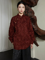 Front view of the Textured Mandarin Collar Cotton Blend Blouse by Gambiered Silk in burgundy with traditional frog-button detailing.