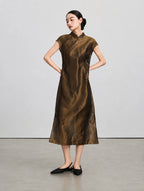 Three-quarter view of the shimmering two-piece qipao set with translucent outer layer and side slits