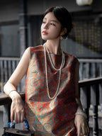 Close model view showing the turquoise and antique-gold medallion pattern of the Shu brocade dress.
