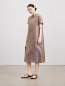 Side view of the vintage-inspired mulberry silk midi dress with a relaxed A-line silhouette.
