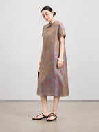 Side view of the vintage-inspired mulberry silk midi dress with a relaxed A-line silhouette.