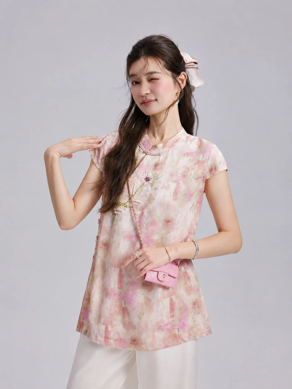 Gambiered Silk watercolor floral top featuring a Mandarin collar, short sleeves and embroidered flower detail