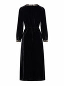 Product-only back view of the black velvet dress with waist tie and embroidered cuffs