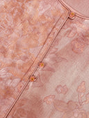 Close-up of the vest’s floral jacquard fabric and gold-accented front buttons