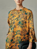 Women's gold floral mulberry silk cheongsam dress with three-quarter sleeves