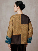 Back view of the model wearing the patchwork jacquard jacket