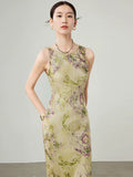 Close-up of sleeveless floral cupro blend maxi dress with soft drape.