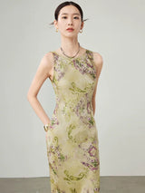Close-up of sleeveless floral cupro blend maxi dress with soft drape.