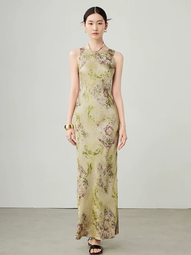 Front full-length view of green floral sleeveless maxi dress for women.