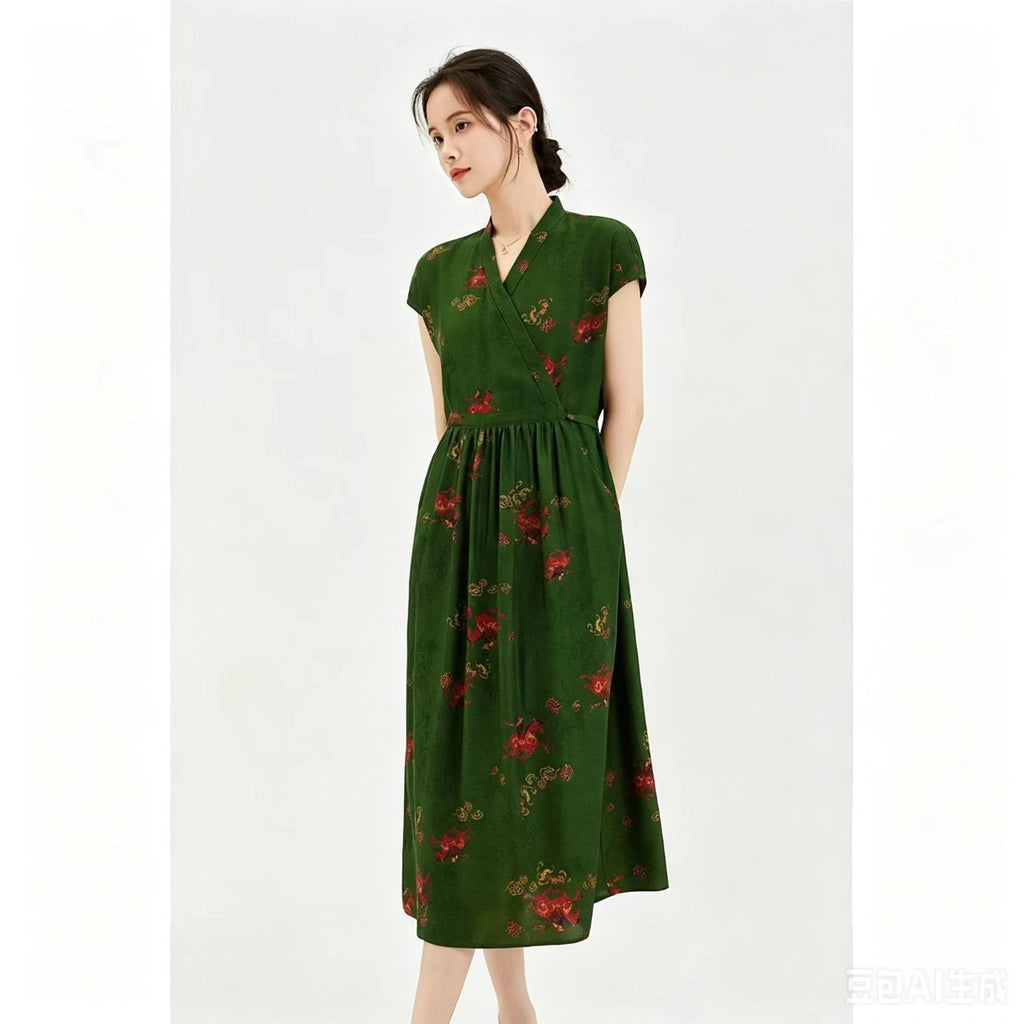 Front view of a women's green Qipao dress with a mandarin collar and wrap front design, featuring red and gold floral embroidery on the skirt, styled with a black handbag.