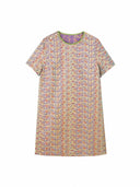 Flat lay of a cream 100% mulberry silk dress with purple and blue geometric heritage print