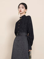 Close-up of the Mandarin collar and jacquard texture on the Ink Black Blouse.