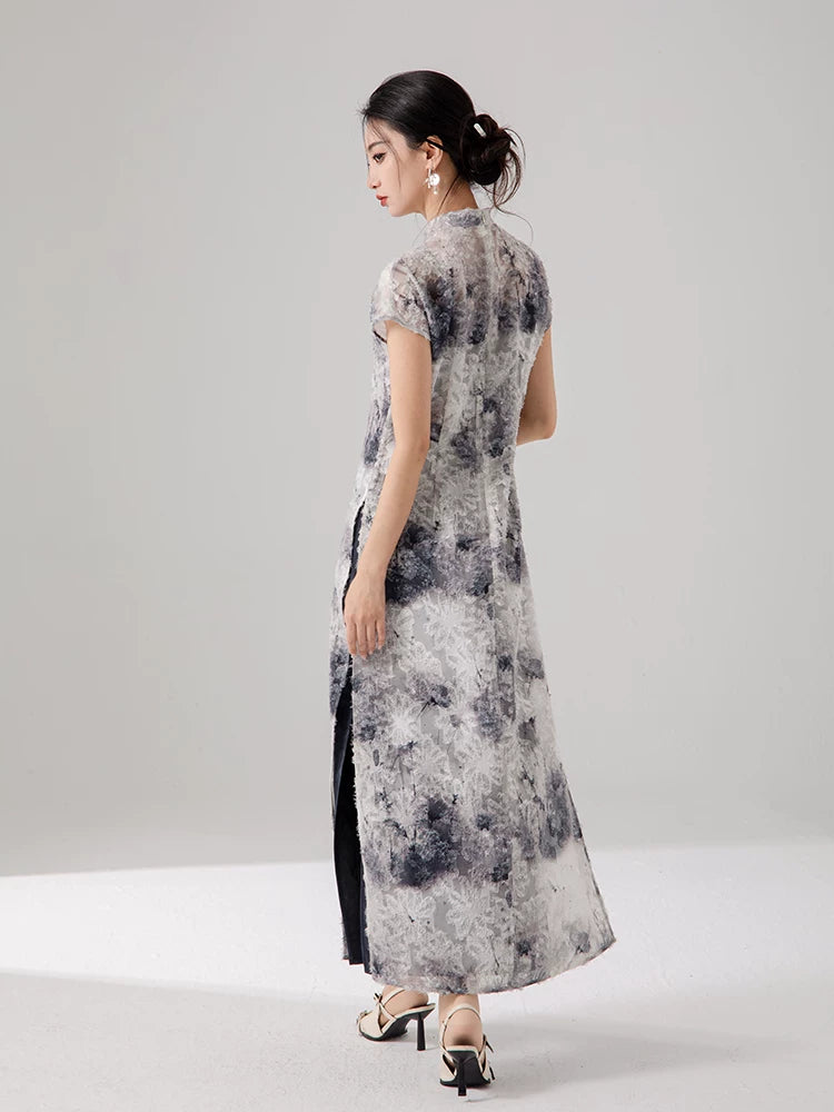 Back view of the ink print layered cheongsam dress with flowing silhouette.