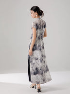 Back view of the ink print layered cheongsam dress with flowing silhouette.