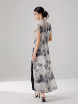 Back view of the ink print layered cheongsam dress with flowing silhouette.