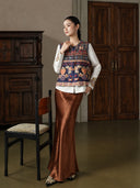 Full-length styling view of the Inkstone Blue embroidered vest