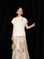 Front view of the ivory silk qipao collar top showing its straight fit and elegant short sleeves