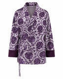 Front product view of the Lavender Plum floral wrap jacket with side ties and solid cuffs