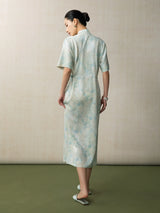 Back view of a light blue jacquard Chinese style midi dress