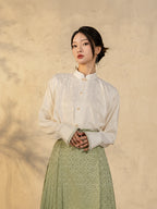 Women's Mandarin collar jacquard blouse with elegant Chinese-inspired design.