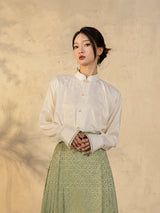 Women's Mandarin collar jacquard blouse with elegant Chinese-inspired design.