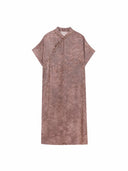 Flat lay of a mauve Sanjing Jiaoluo dress with a stand collar and relaxed H-line design
