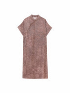 Flat lay of a mauve Sanjing Jiaoluo dress with a stand collar and relaxed H-line design
