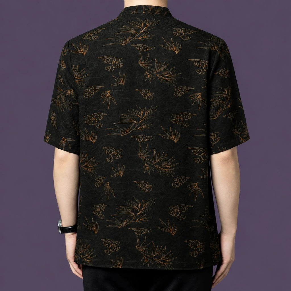 Back view of the bamboo and cloud patterned silk shirt, demonstrating the continuous, flowing motif across the entire garment.