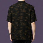 Back view of the bamboo and cloud patterned silk shirt, demonstrating the continuous, flowing motif across the entire garment.
