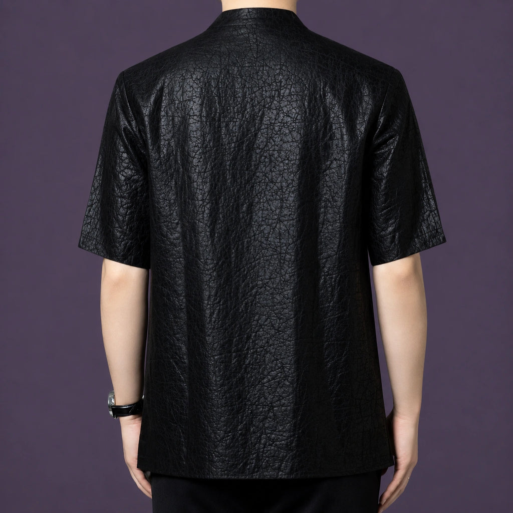 Back view of the men's black silk shirt showcasing the consistent, deeply textured crackle finish that runs across the entire garment.