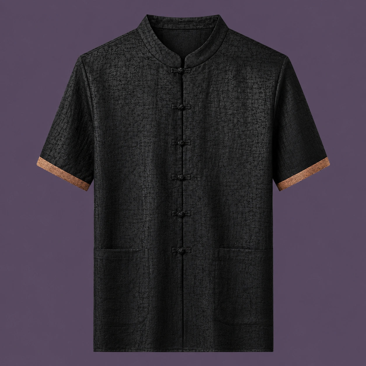 Flat lay of the men's short-sleeve silk top, featuring a stand collar, six front frog buttons, two patch pockets, and distinctive brown cuffs.