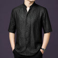 Men's black 100% mulberry silk short-sleeve shirt with a relaxed fit, a stand collar with a subtle V-opening, and a classic button placket.