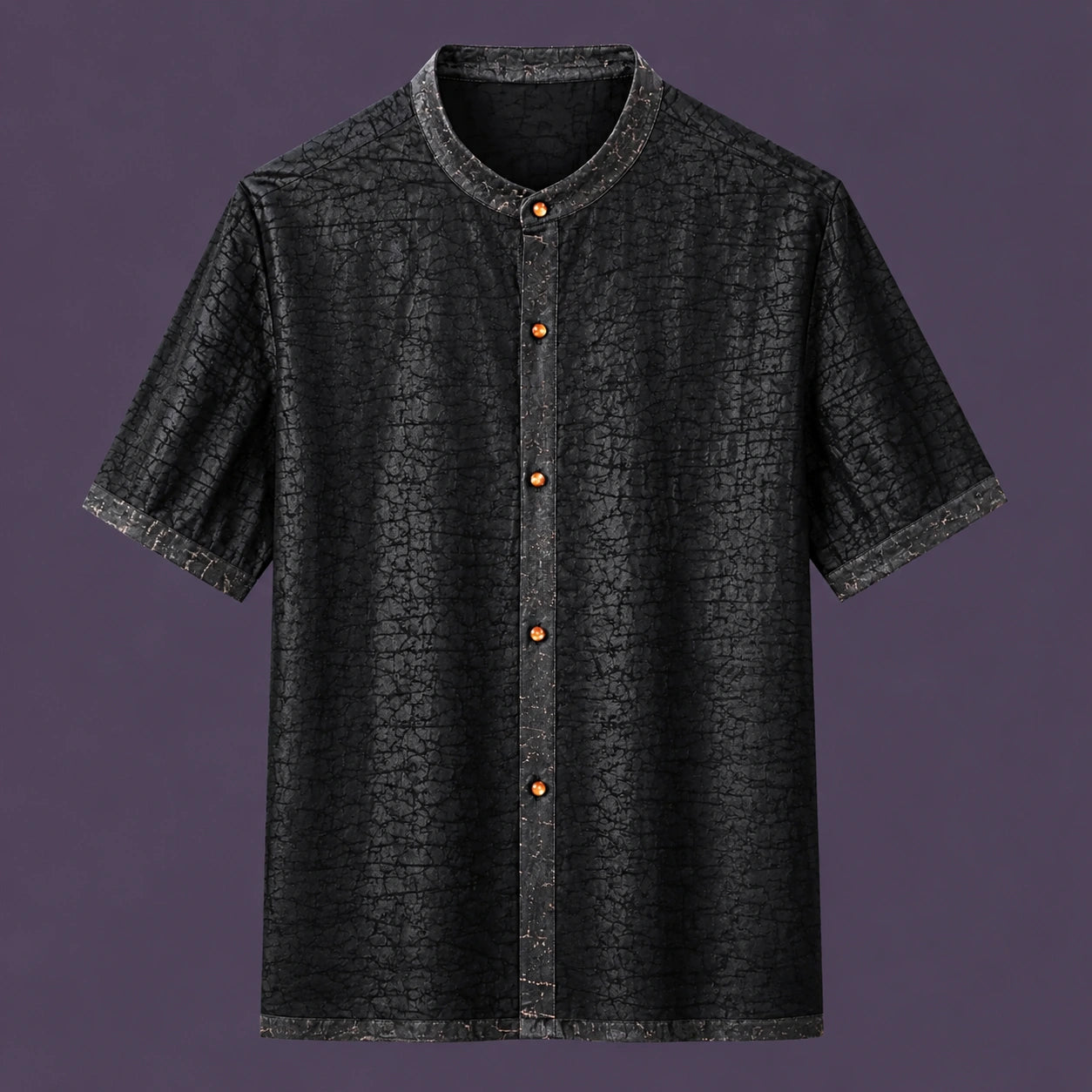 Flat lay of a black men's short-sleeve silk shirt with a mandarin collar, contrasting amber buttons, and a distinctive textured finish.