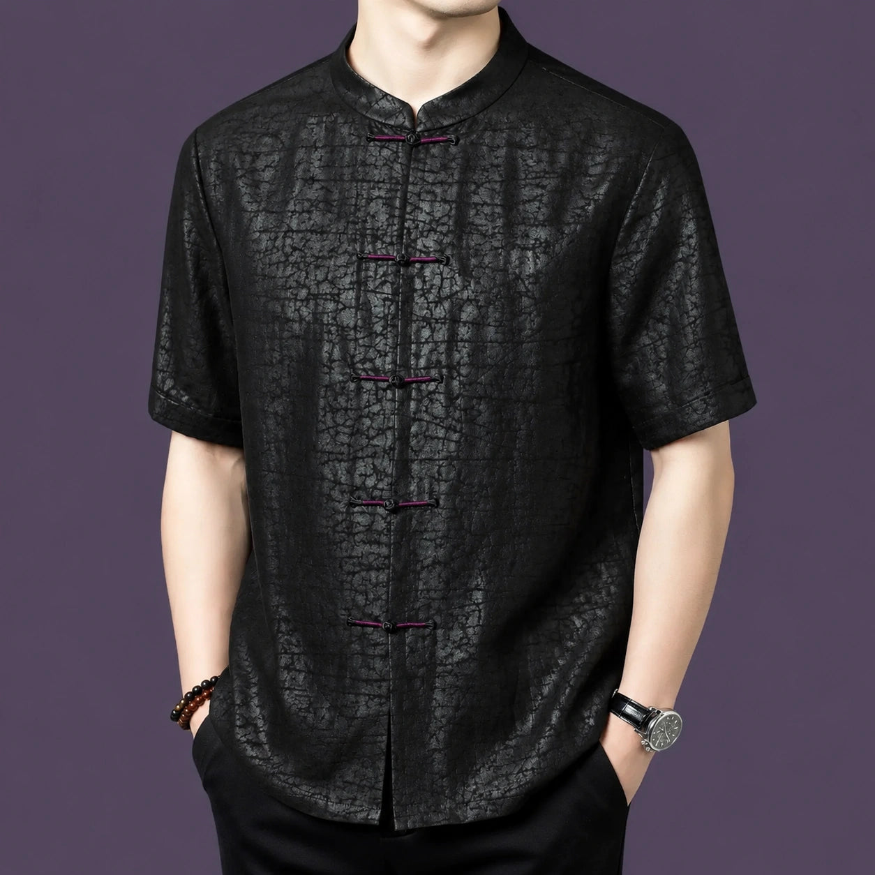 Alternate front view showcasing the relaxed cut and the unique cracked pattern on the black mulberry silk fabric.