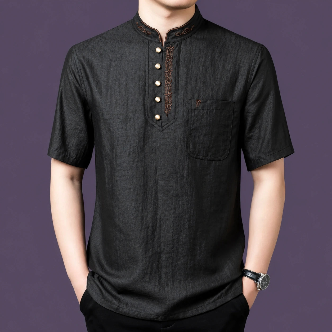 Men's black 100% silk henley shirt featuring a stand collar with subtle bronze embroidery, paired with black trousers.
